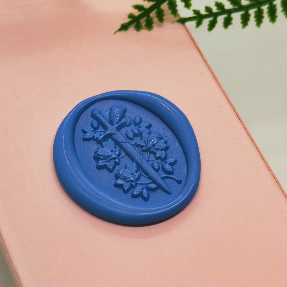 A 3D relief sword roses wax seal stamp from AMZ Deco.